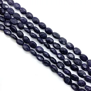 Faceted oval blue sandstone beads for DIY jewelry with sparkling starry night texture
