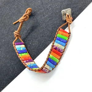 Handmade bohemian rainbow jasper bead bracelet with brown leather cord and metal clasp