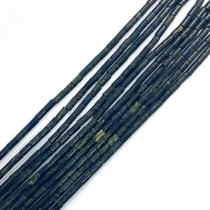Detailed view of polished cylindrical tiger eye stone beads for DIY jewelry making