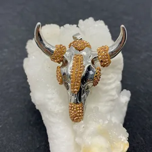 Ethnic bull head pendant with orange rhinestones and silver metal finish for DIY necklaces
