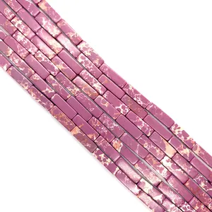 Macro view of purple natural stone tube beads with marbled texture for DIY jewelry