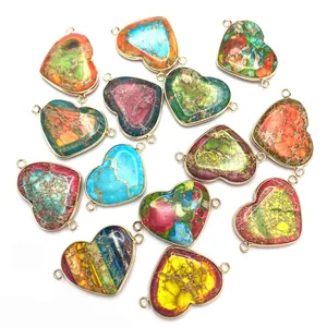 Set of 13 colorful heart-shaped turquoise stone pendants with gold-plated metal edges