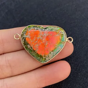 Natural heart turquoise pendant with gold plated bezel and double connector loops
