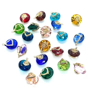 Detailed view of faceted crystal pendants in heart and round shapes for DIY jewelry