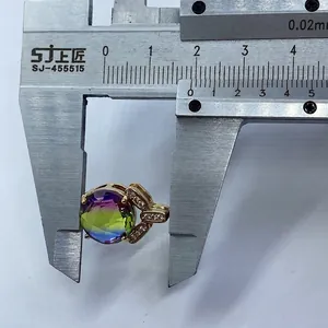Detail shot of a faceted gradient crystal pendant measured with a digital caliper