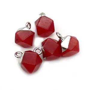 Detailed view of four faceted red agate pendants with silver loops for DIY jewelry making