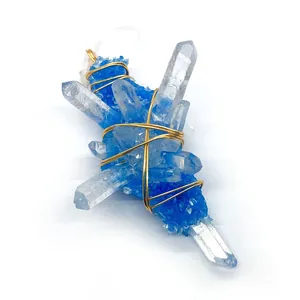 Handmade wire wrapped natural crystal pendant with blue gradient crystals and gold wire