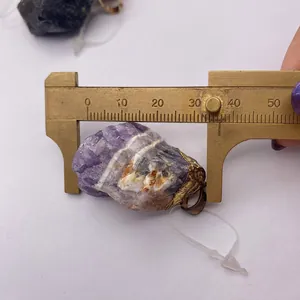 Detailed macro view showing a 35mm measurement of the natural amethyst stone pendant
