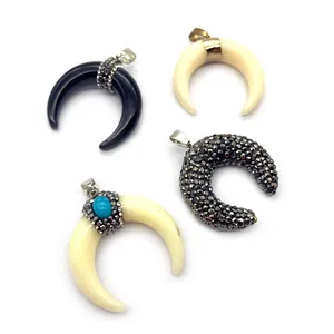 Set of resin moon and horn pendants with diamond accents for DIY necklace making