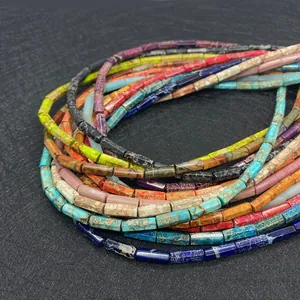 Macro detail of colorful cylindrical emperor stone beads for DIY jewelry making
