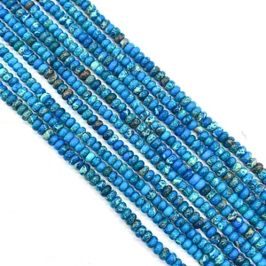 Vue à plat de perles disques en pierre impériale bleue polie pour création bijoux DIY