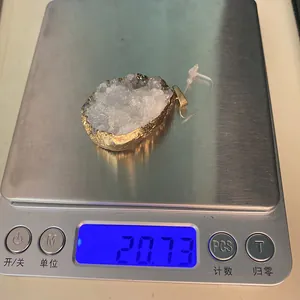 Measurement showing a 20.73g natural crystal cluster pendant with gold metal edging
