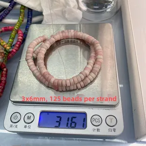 Meting van 3x6mm roze stenen kralen op schaal met een gewicht van 31,61g voor DIY-sieraden