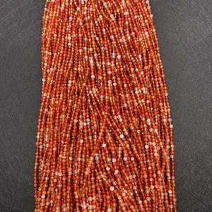 Macro shot of faceted 2mm-4mm natural red agate loose beads for DIY jewelry making