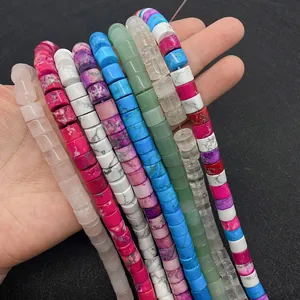 Macro detail of colorful cylindrical gemstone beads with straight holes for DIY jewelry
