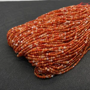 Detailed view of faceted natural carnelian beads for DIY jewelry making