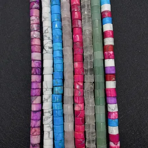 Macro view of 6x9mm cylindrical natural stone beads in various colors for jewelry DIY
