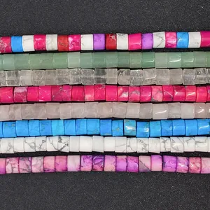 Macro view of assorted 6x9mm cylindrical natural stone beads for DIY jewelry making