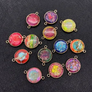 Detailed view of colorful round imperial stone connectors with gold plated double loops