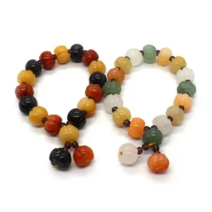 Pulseras de cuentas de piedra con forma de calabaza de colores y detalles grabados