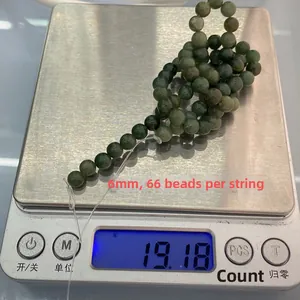 Détail de perles en pierre empereur verte de 6mm pesant 19,18g pour bijoux DIY