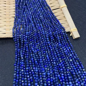 Macro shot of faceted blue lapis lazuli beads with natural textures for jewelry making