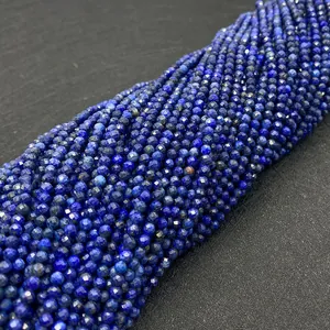 Close-up of faceted deep blue lapis lazuli beads for DIY jewelry necklaces