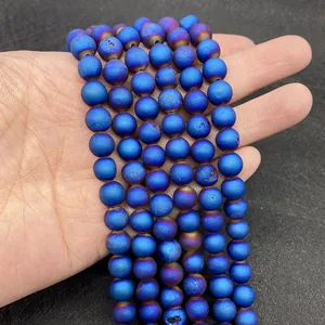 Close-up of 8-10mm blue-purple druzy agate beads with electroplated metallic finish