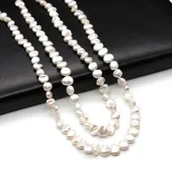 Detailed view of 8-9mm white baroque freshwater pearls with high luster for DIY jewelry