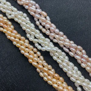 Natural 3-7mm freshwater rice pearls in white, pink, and orange for jewelry making