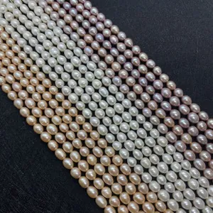 Close-up of 7-8mm freshwater baroque pearls in white, pink, and purple for DIY jewelry