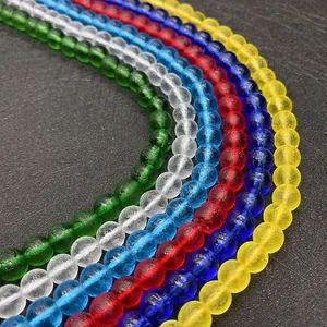 Macro view of matte natural stone beads in various colors for DIY jewelry making