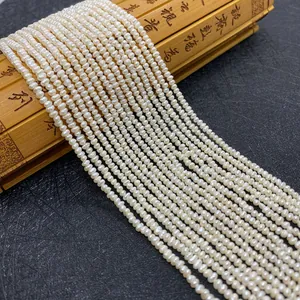 Natural small white freshwater pearl strands for DIY jewelry making on bamboo scroll