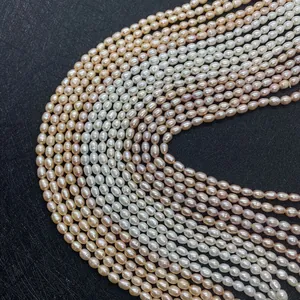 Macro view of natural freshwater pearls in white and pink shades for DIY jewelry