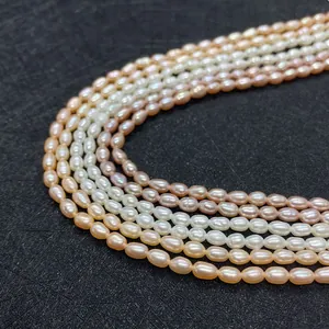 Macro shot of multi-layer natural freshwater rice pearls in white and pink hues on black