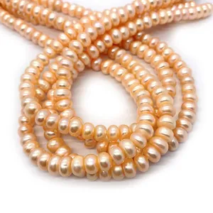Strands of AA grade natural orange-pink freshwater pearls for DIY jewelry making