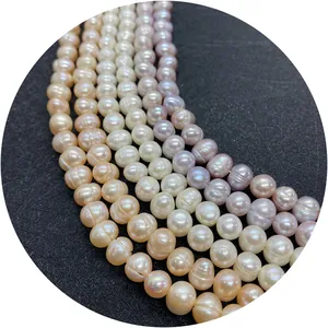 Natural freshwater pearl strands in white, pink, and purple with organic ring textures