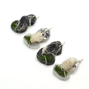 Handmade wire wrapped natural amethyst and crystal stone pendants with green moss detail