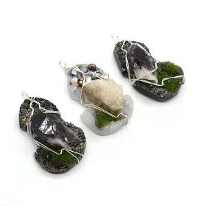 Handmade wire wrapped natural crystal pendants with resin pearls and moss decoration