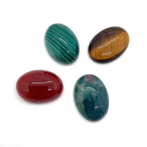 Set of 13x18mm oval polished gemstones including tiger eye, malachite, and agate
