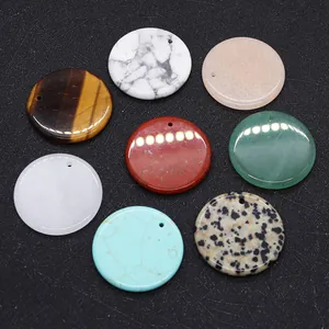 Polished circular natural gemstone pendants in diverse colors with top-drilled holes