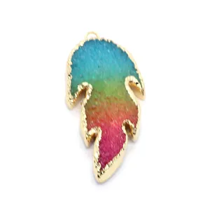 Rainbow gradient leaf crystal pendant with gold edge and textured metal bail
