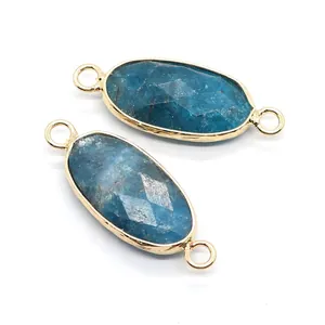 Details von facettierten ovalen blauen Steinverbindern mit Goldrand für DIY-Schmuck