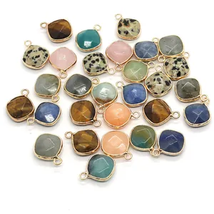 Tiger eye and rose quartz faceted rhombic pendants with gold plated metal borders