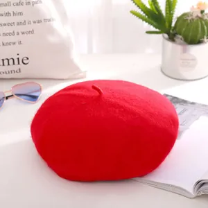 Classic red wool beret for women with top stem detail and stylish felt texture