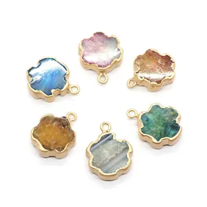 Set of six natural stone flower pendants with gold plated edges and colorful crystals