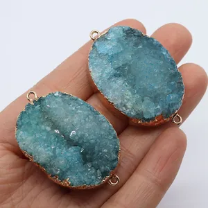Set of two blue oval crystal agate quartz connectors with rose gold plated metal trim