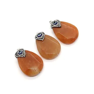 Orange natural stone waterdrop pendants with evil eye rhinestone accents, set of three