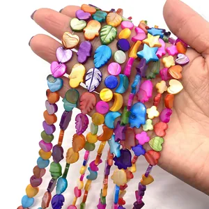 Colorful dyed shell charms in heart, star and hamsa hand shapes for DIY jewelry making