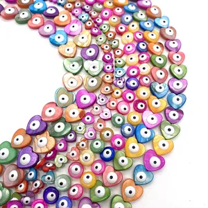 Colorful heart-shaped evil eye shell beads with natural mother of pearl luster for DIY jewelry